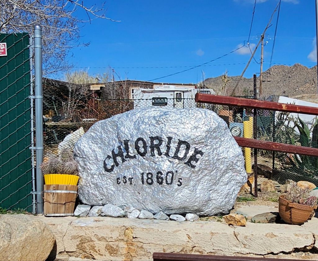 A rock painted Silver to welcome you to Chloride, Arizona
