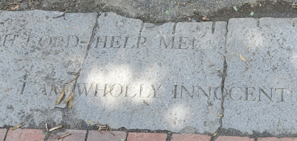A message carved in the stone at the Witches Memorial in Salem